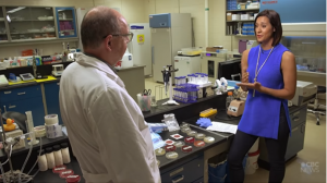 CBC inside a lab with Microbiologist discussing the pathogens found.  