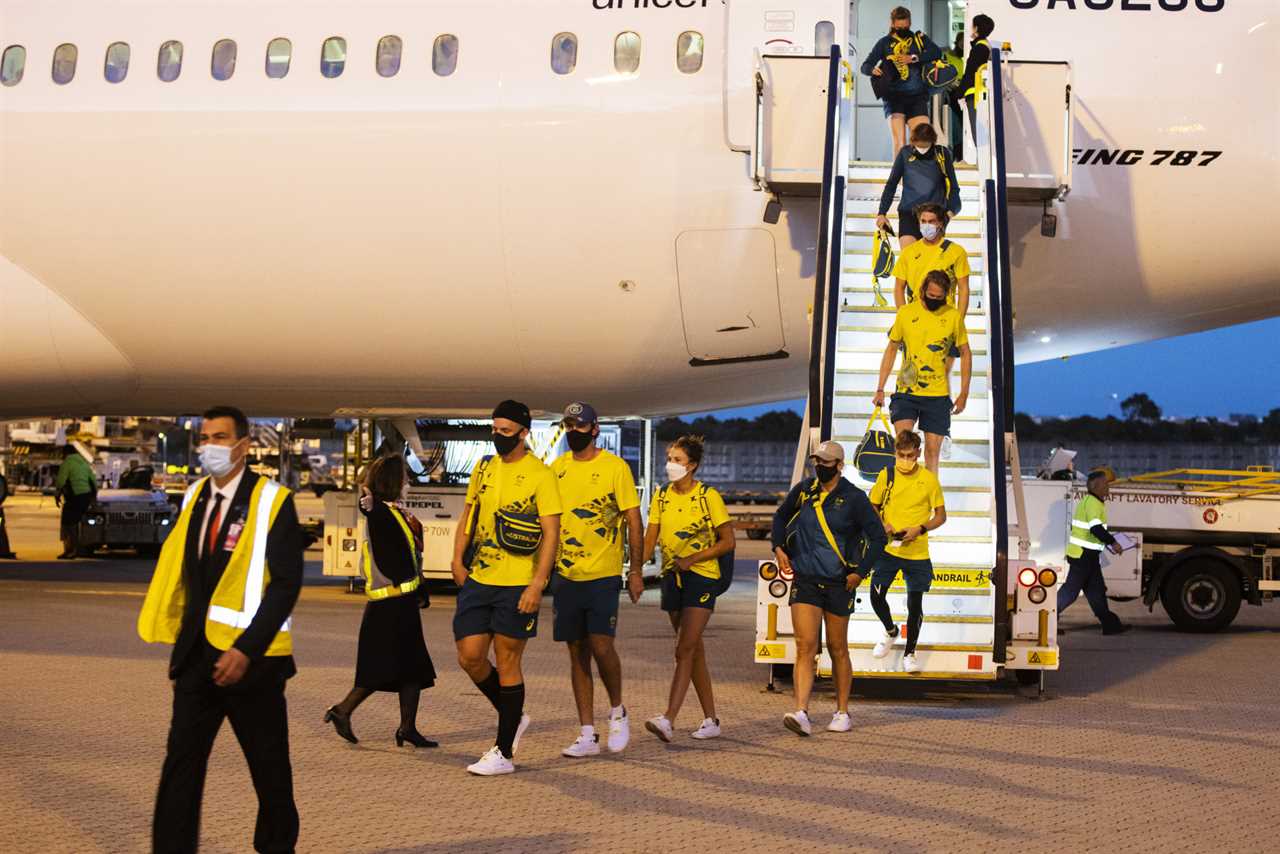 Australian athletes begin mandatory two-week quarantine after return from Tokyo onboard a Japan Airlines Flight