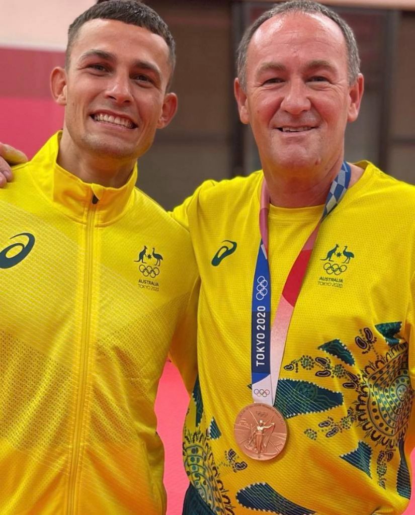 Harry Garside with coach Kevin Smith after winning bronze at the Tokyo Olympics