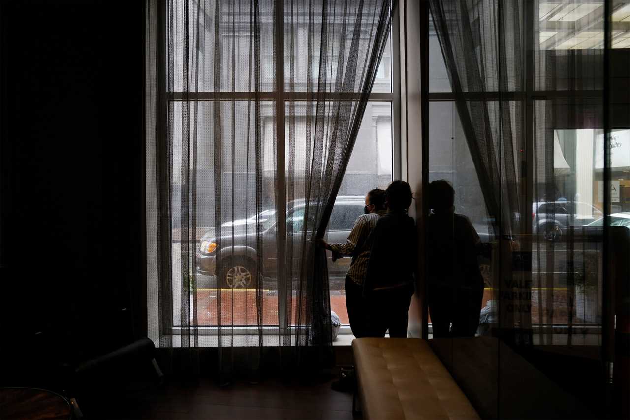 Hotel guests looking out the window as Hurricane Ida neared New Orleans