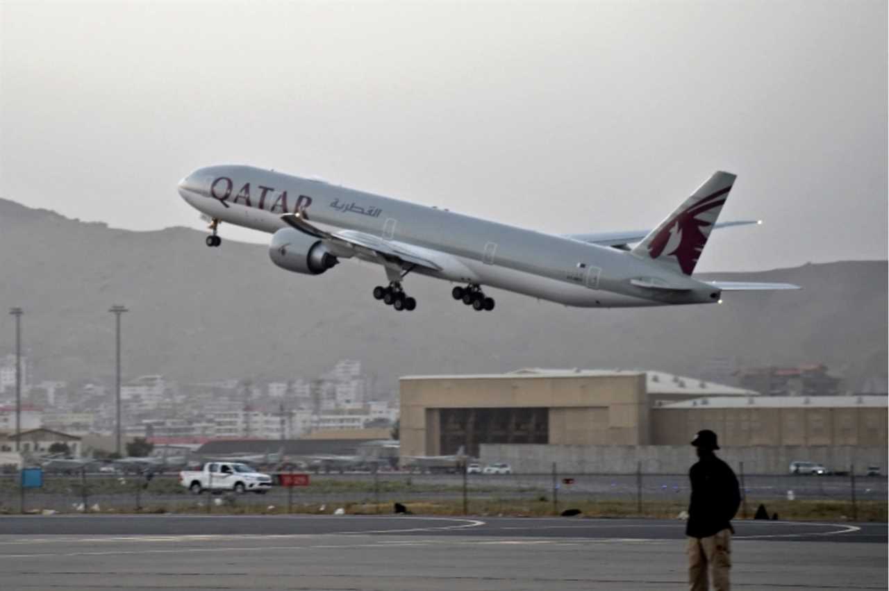 Showing Qatar Airways plane departing