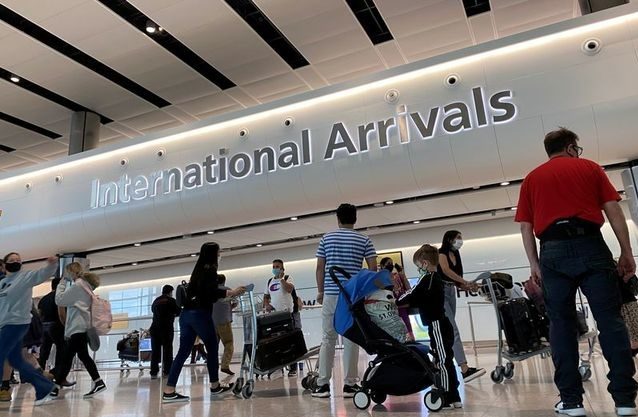 Photo of international passengers arriving at Heathrow Airport