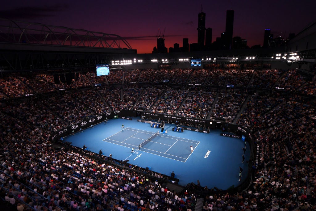 A tennis match in a stadium.