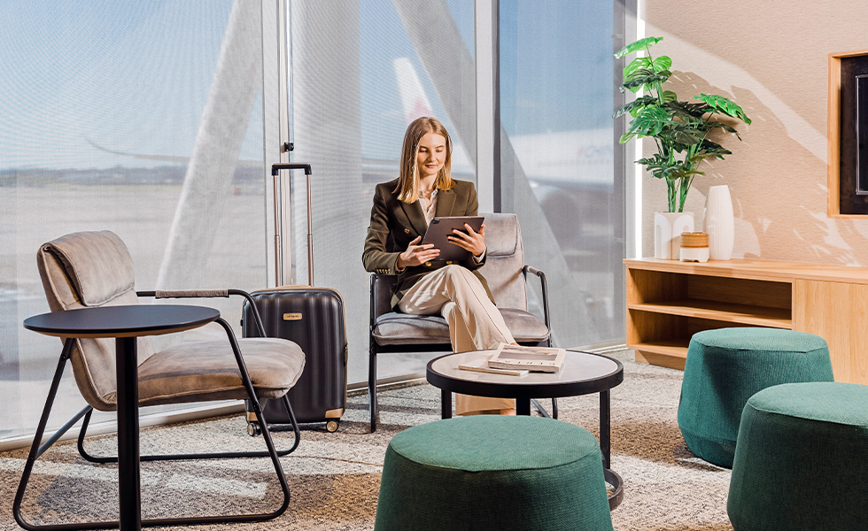 Traveller relaxing in the new Sydney SkyTeam Lounge that has sustainability at its focus