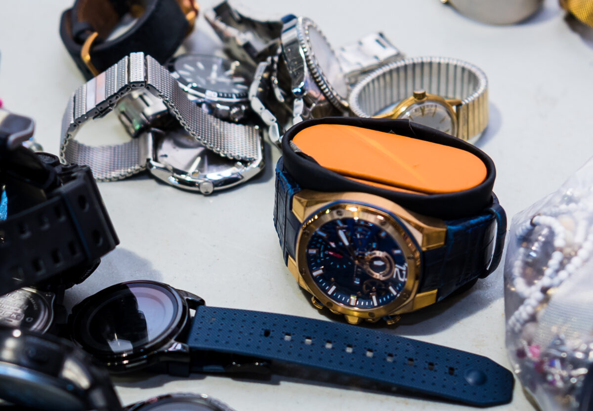 Some lost and found watches laid on a table