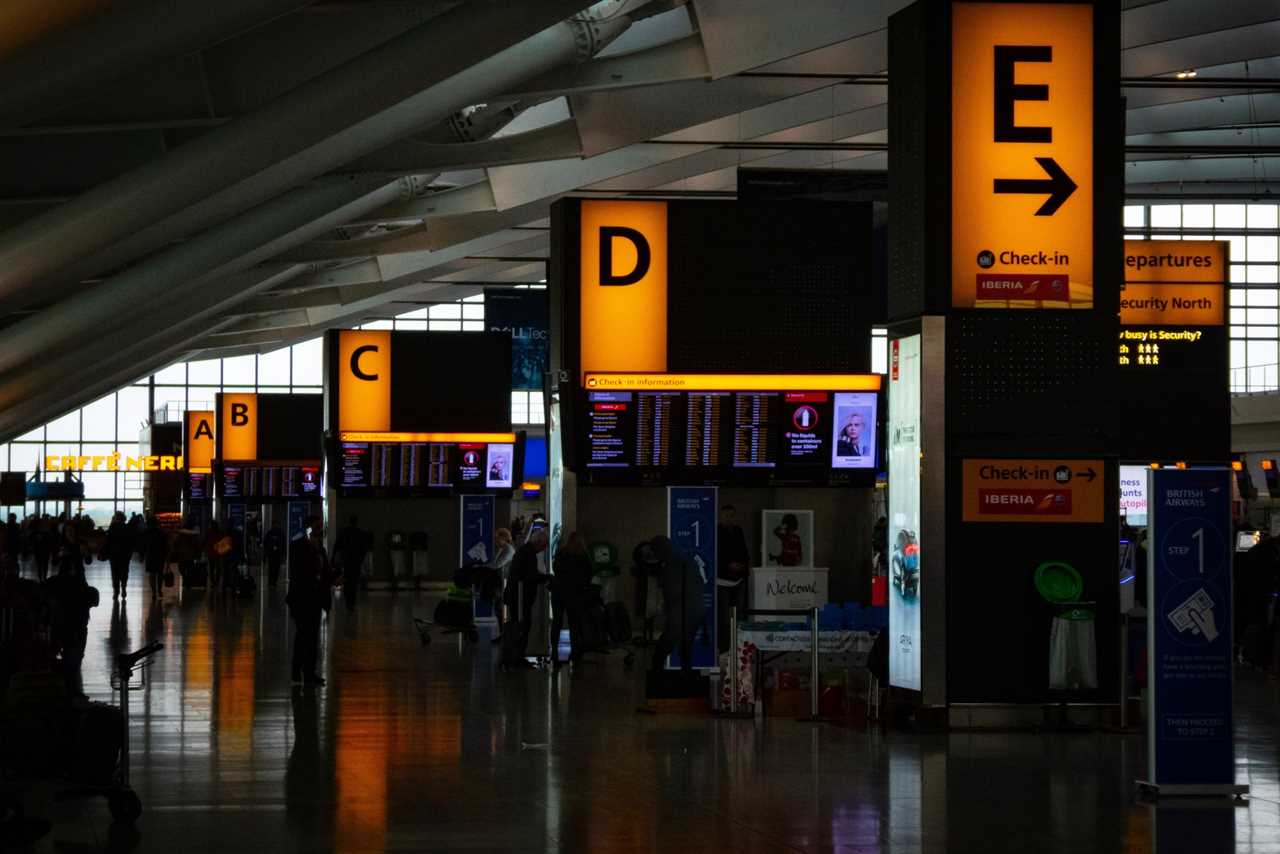 Check-in information points A-E at London Heathrow Airport