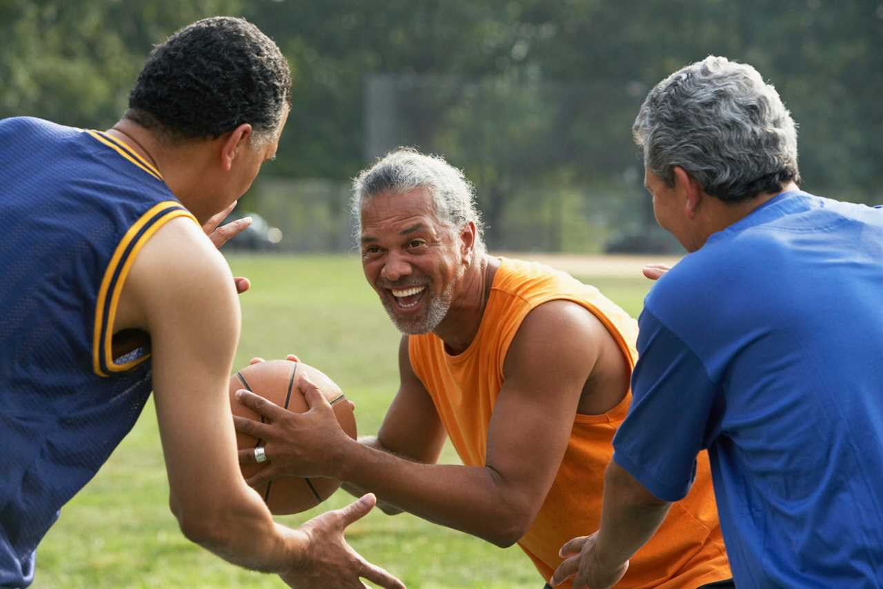 Men playing basketball