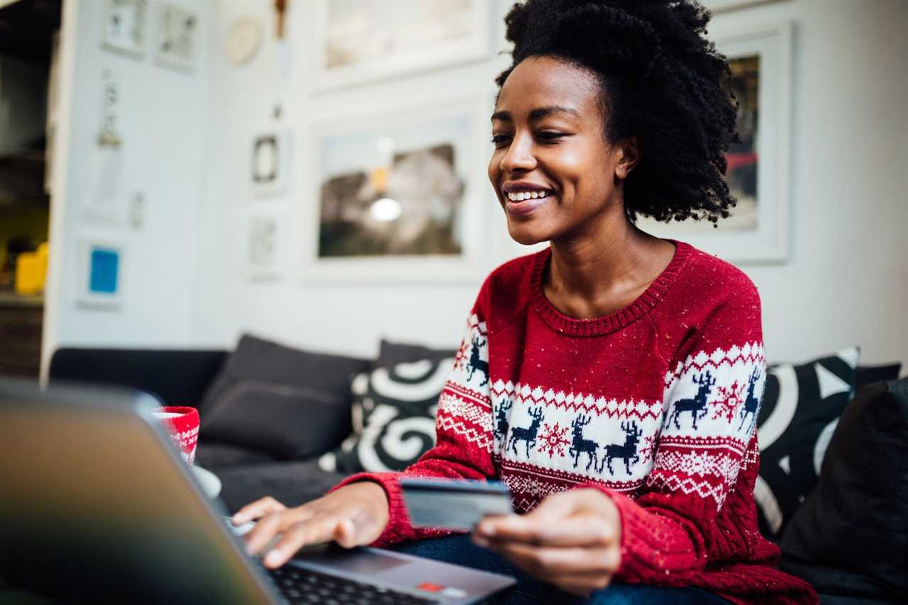 Woman shopping online from her home office