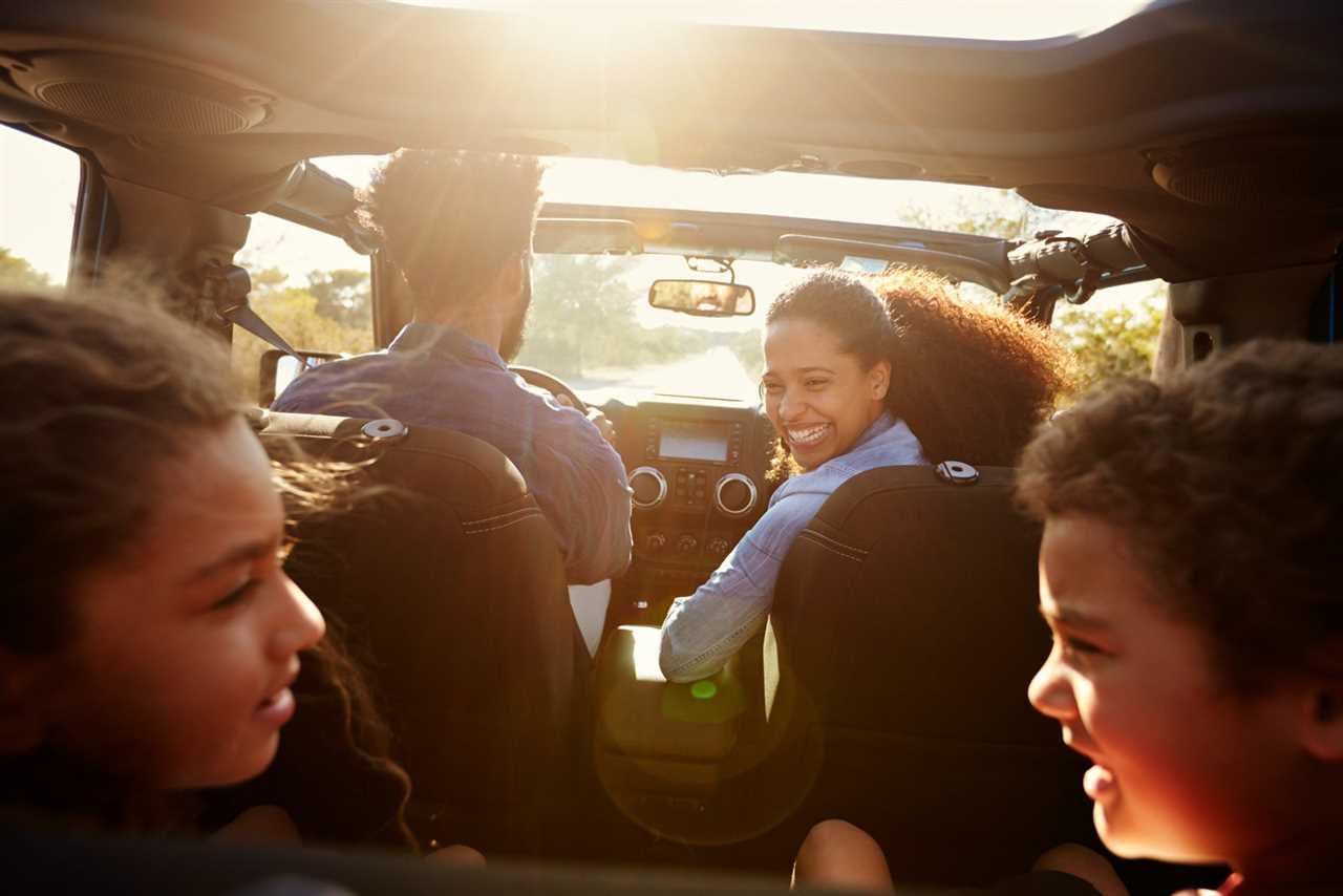 A family inside a car during a road trip