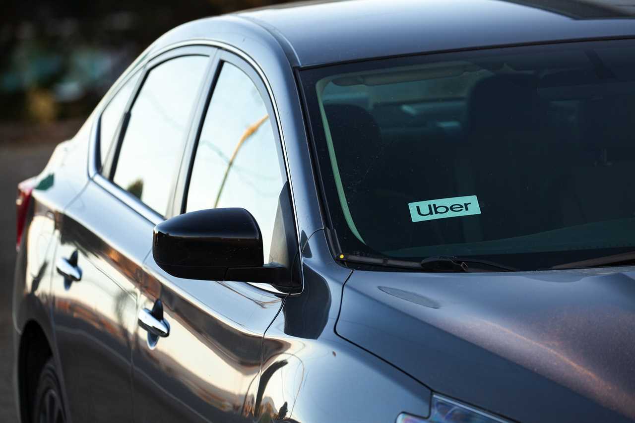 Car with an Uber sticker in the windshield in Portland, Oregon