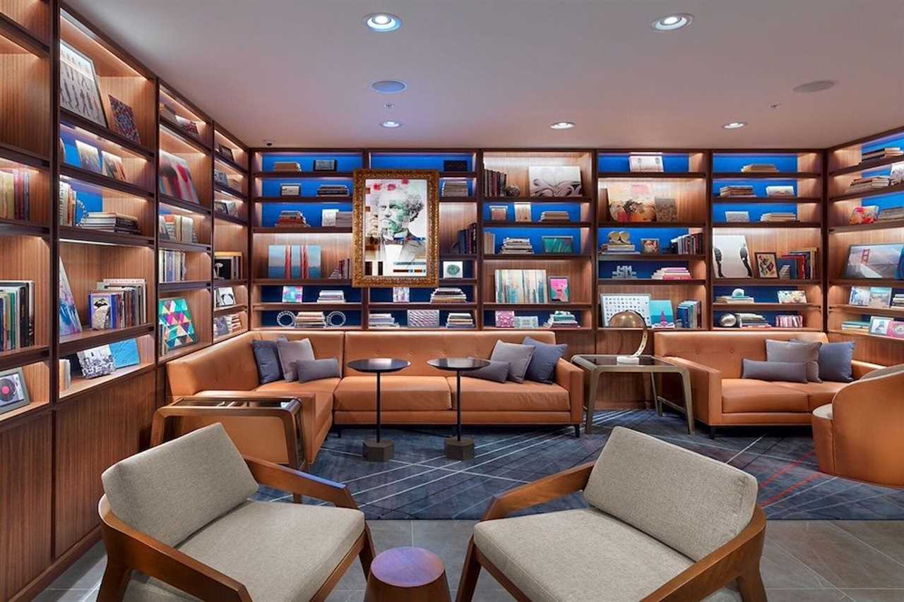 Chairs and tables in a colorful hotel lobby