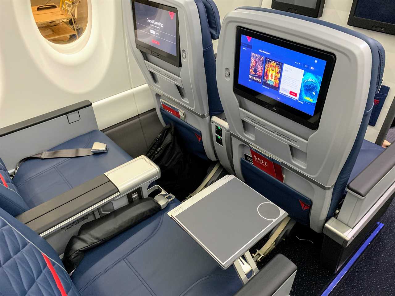 First-class seats on a Delta A220 (Photo by Darren Murph / The Points Guy)