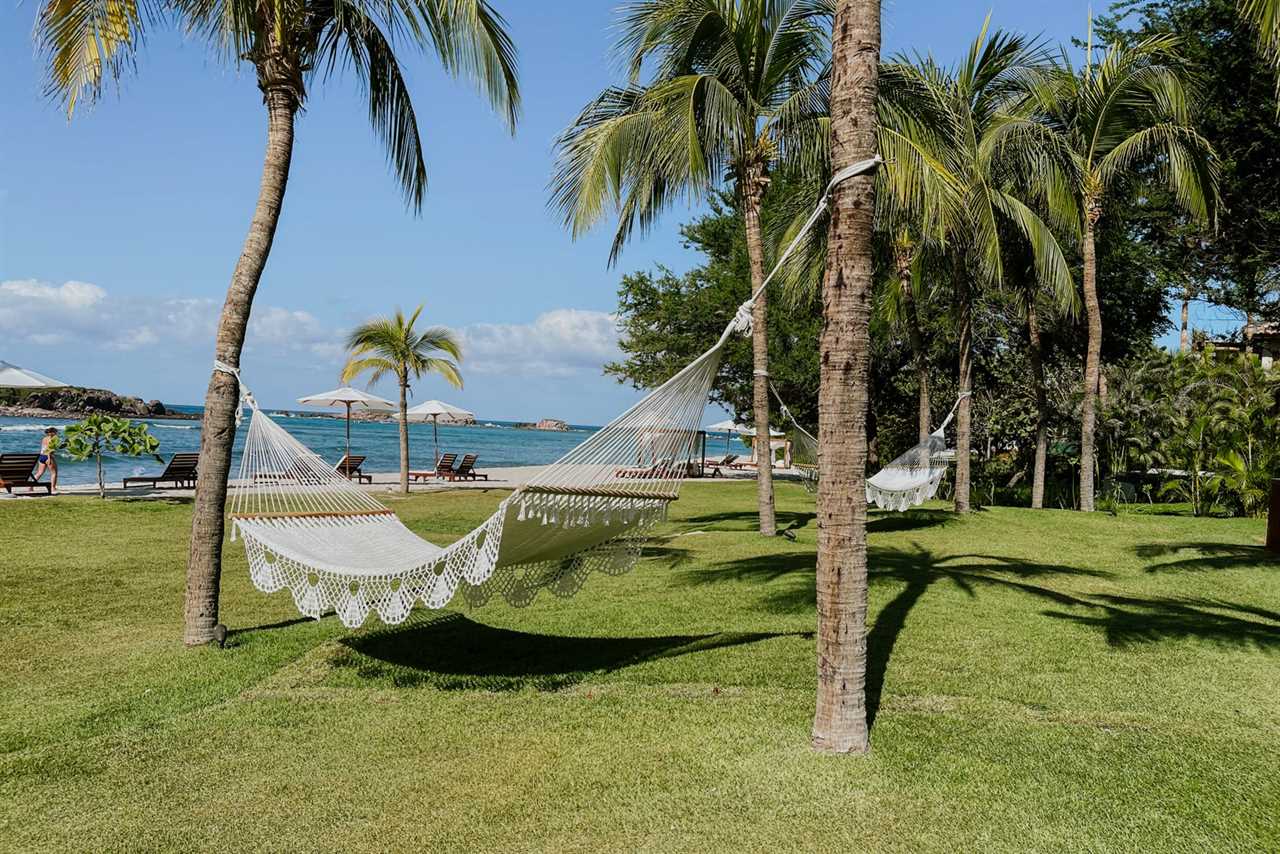 Hammock on the lawn overlooking the beach at St. Regis Punta Mita