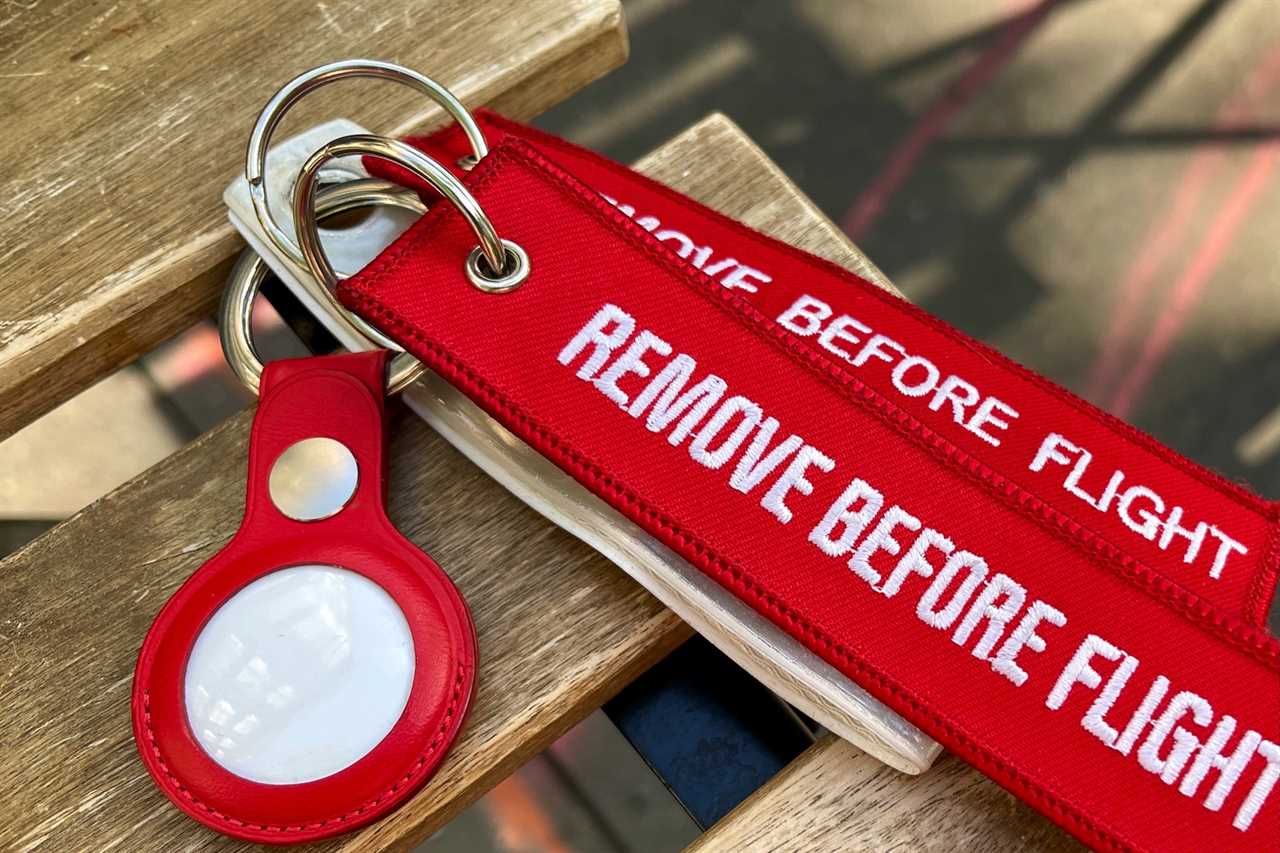 AirTags with remove before flight keychains