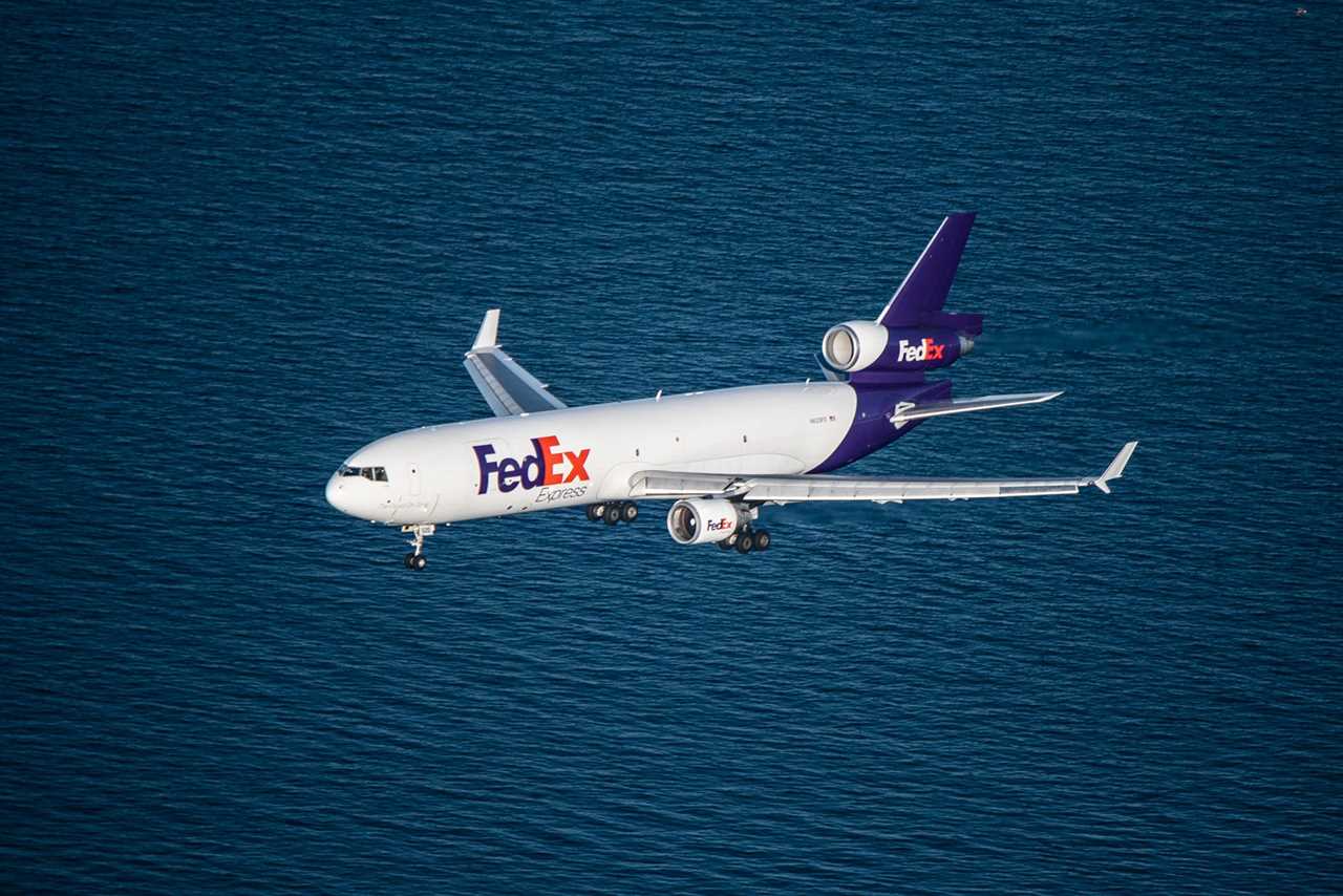 Fedex-MD-11-2-approaching-Sydney-Airport-SYD-Qantas-Terminal-at-Sydney-Airport-SYD