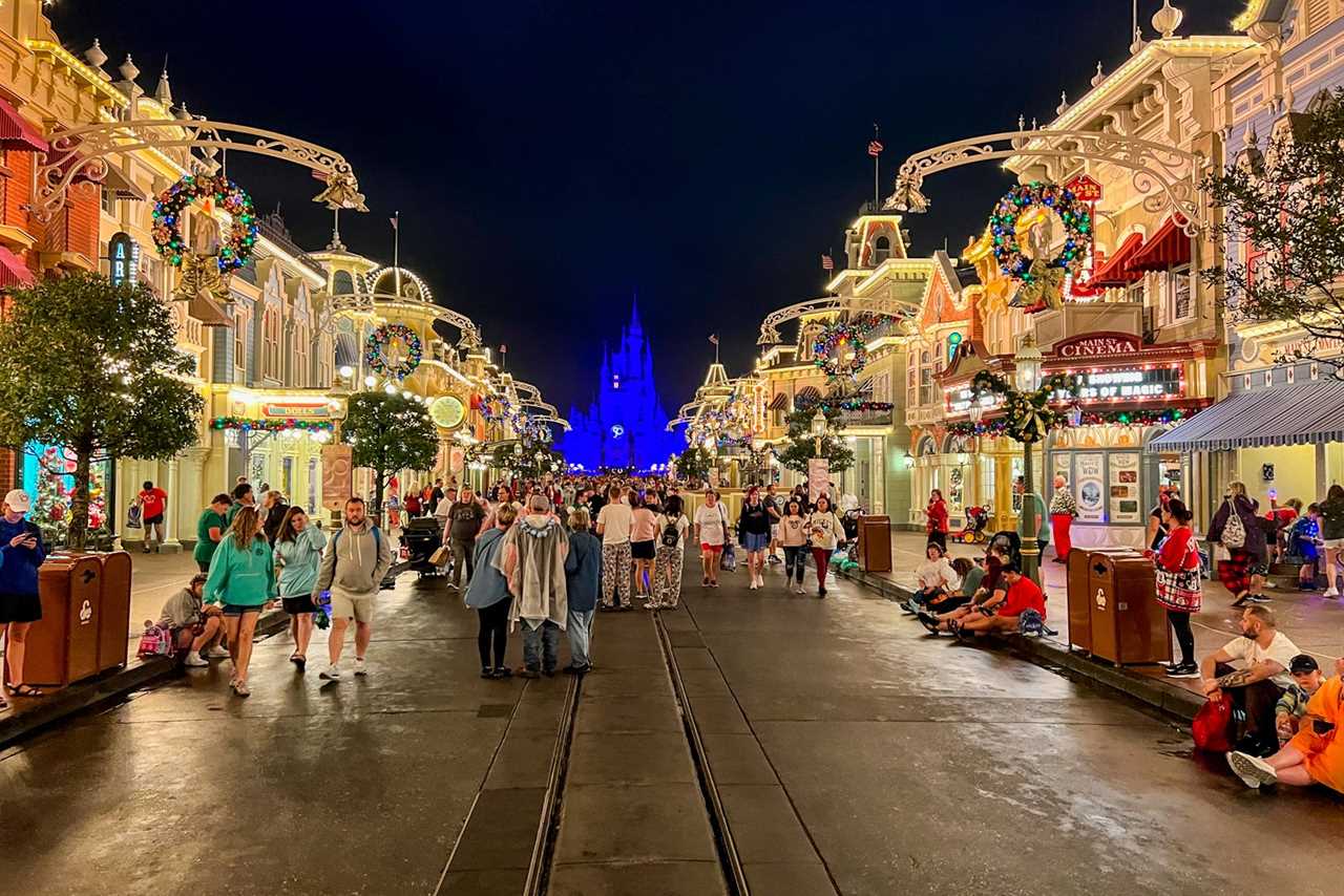 Disney World at night decorated for Christmas