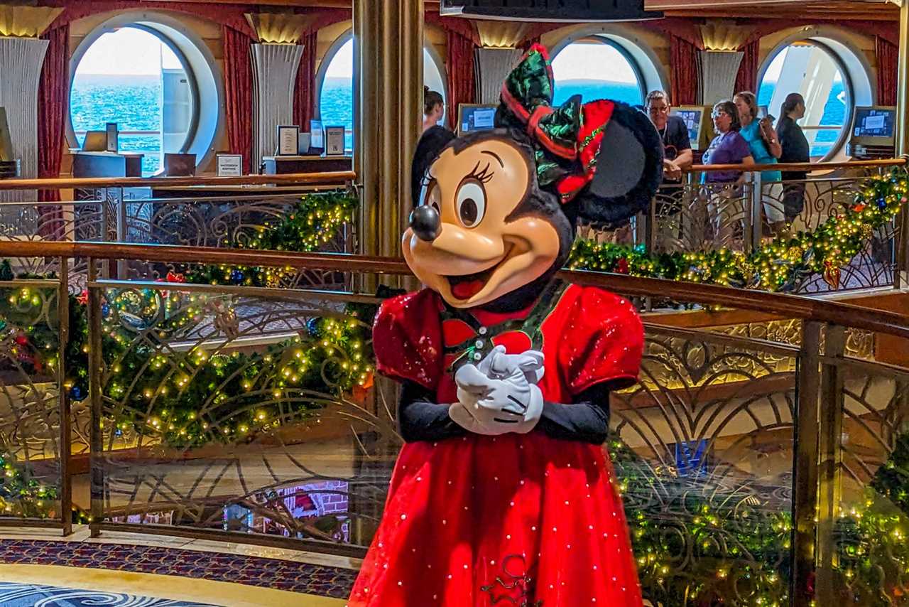 Minnie Mouse posing for photos.