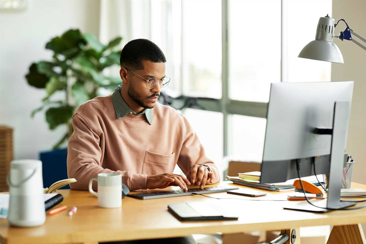 Man using a computer at home