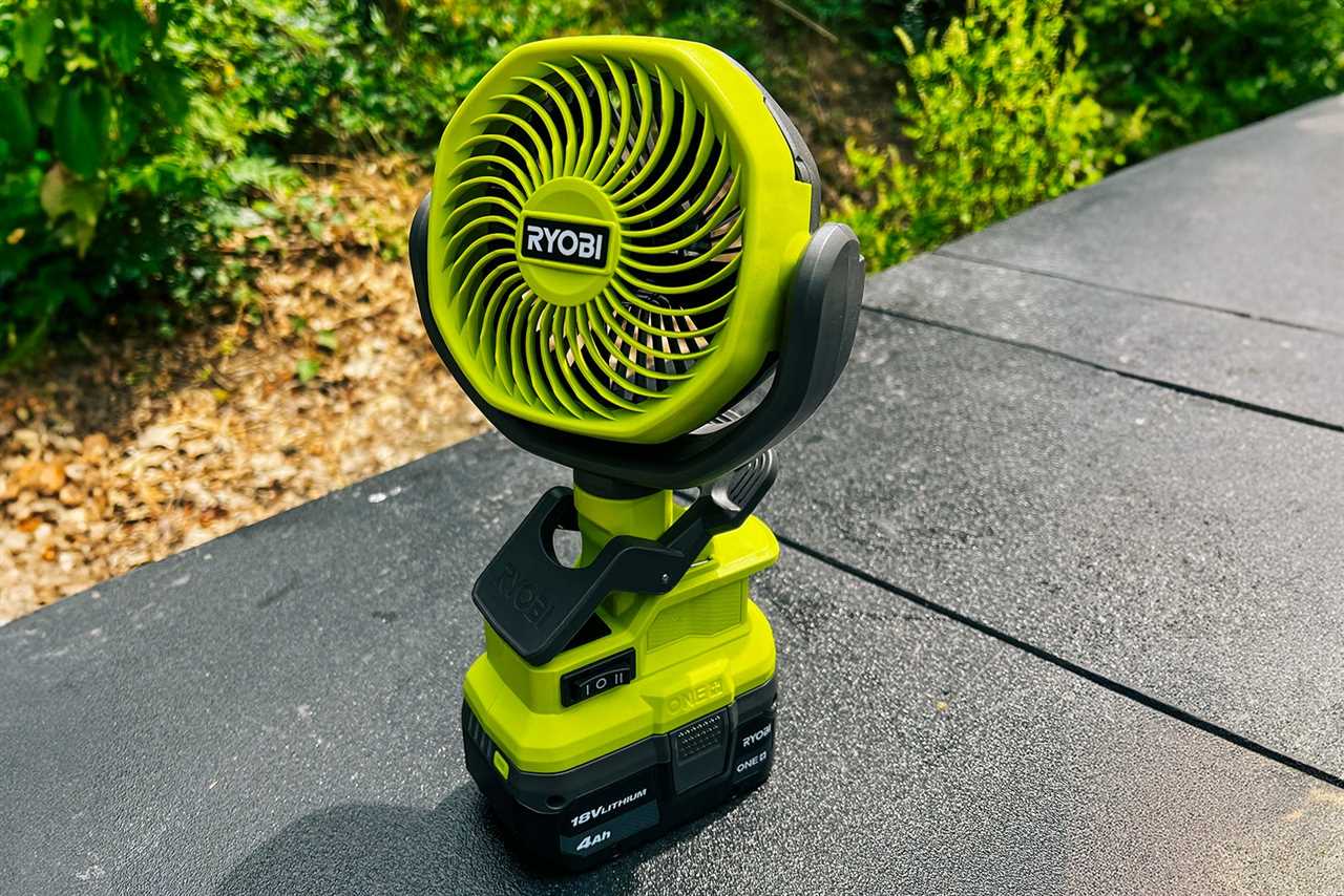 Ryobi ONE+ 18-Volt Clamp Fan resting outdoors.